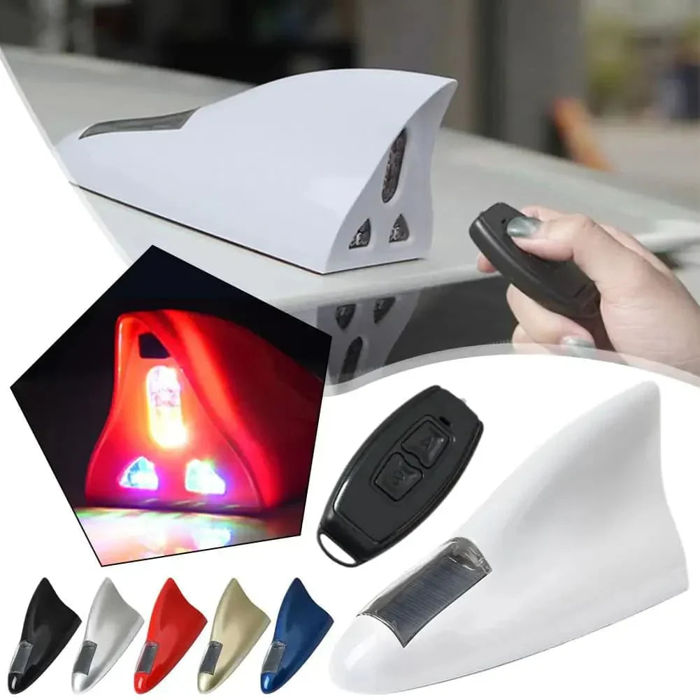 Night view of car with LED shark antenna on top